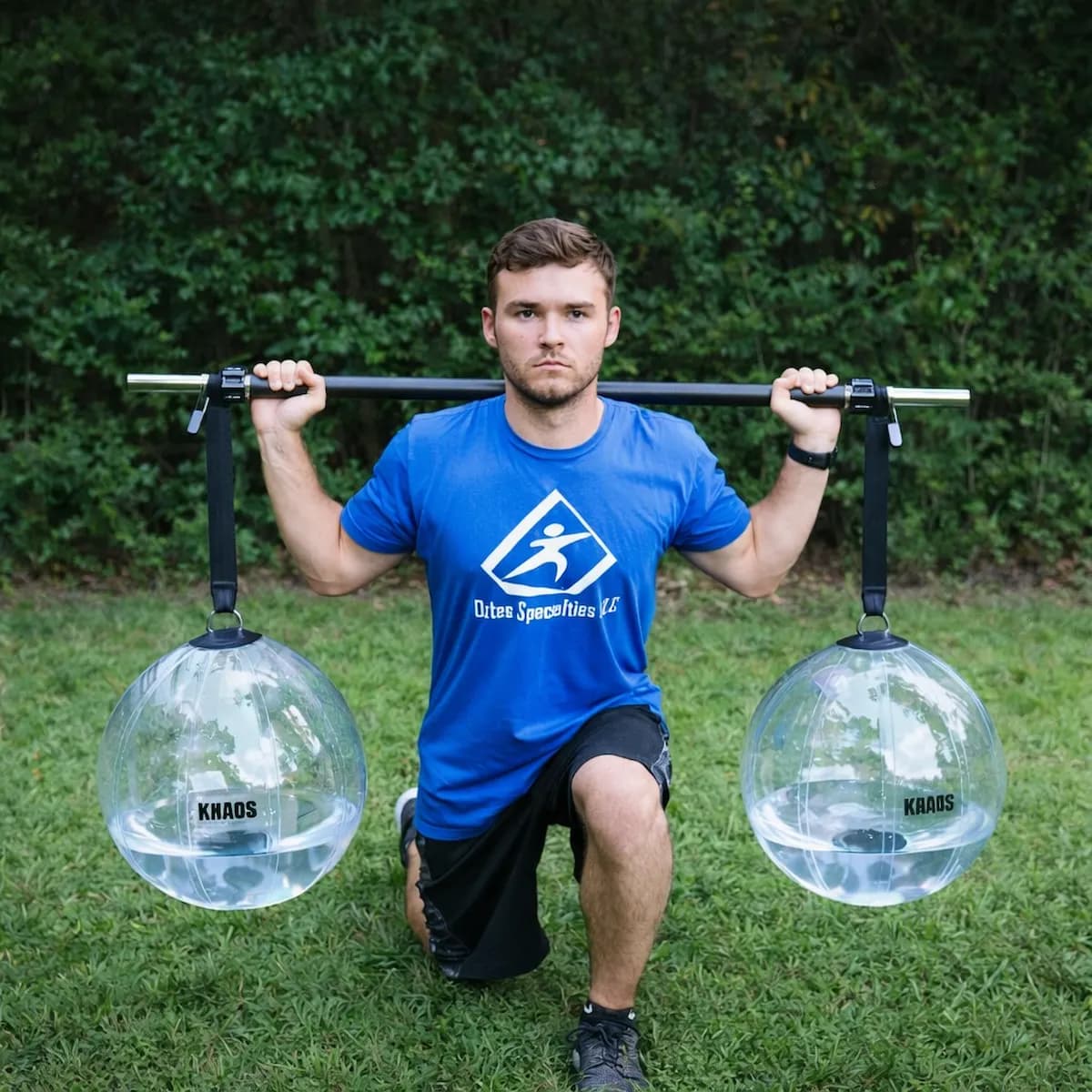 Oates Specialties KHAOS® Water Yoke – Suspended Water Sphere Bar for Three‑Dimensional Stability & Postural Control, wrist weights and shoulder tools: photo from Oates Specialties